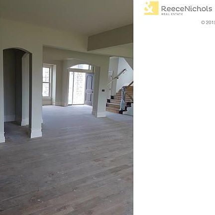 View from the kitchen of dining room and entry