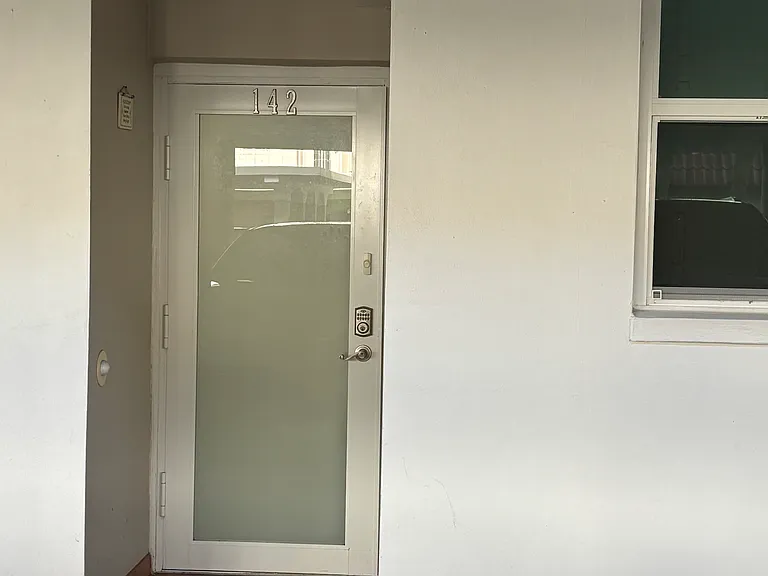 Front door - first floor covered parking spot directly in front
