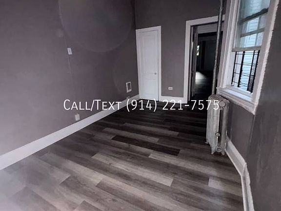 3rd image of 165 E 3rd St APT 2E