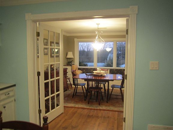 Kitchen through french doors to front dining