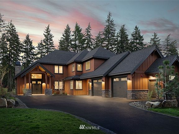 Breathtaking sunset & mountain views from oversized stamped stained cover patio.