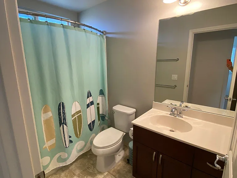 Guest bathroom with bathtub