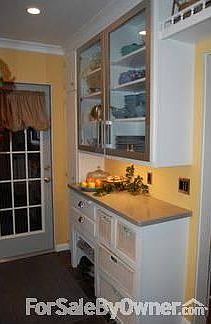 Kitchen entrance off of brick patio