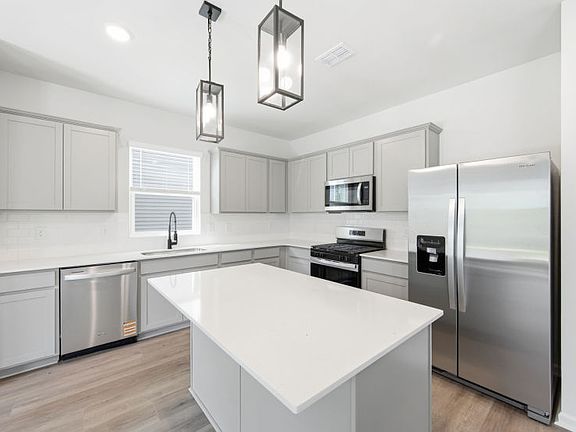 Designer Inspired Pendants over Center Island