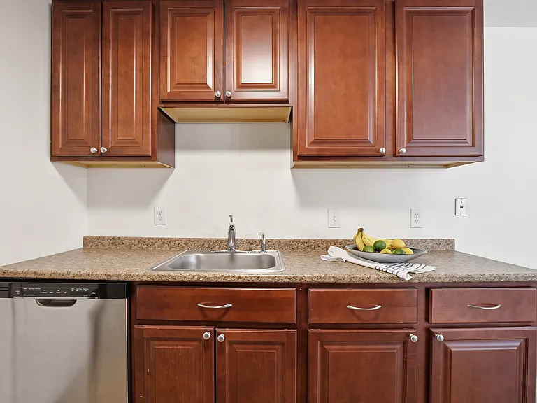 granite countertops, stainless steel appliances, and ample cabinet space
