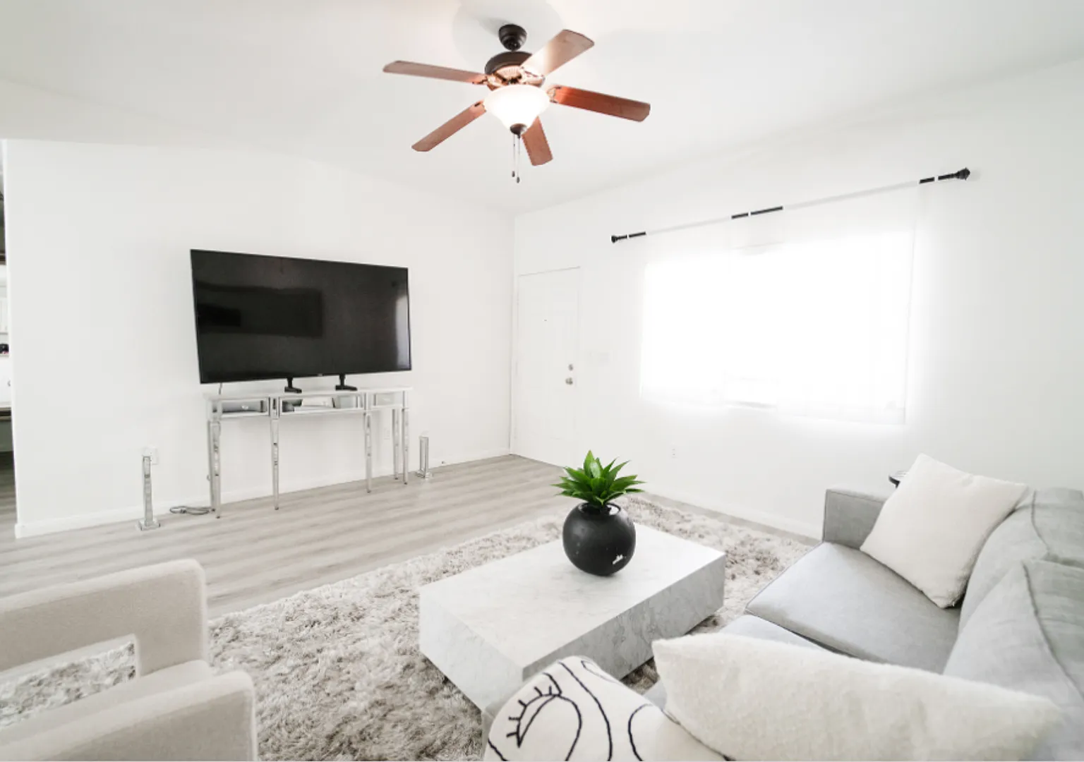 Bright & Open, Renovated First-Floor Fully Furnished Condo — Photo 1