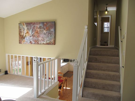 Stairs leading up to master bedroom and two large secondary bedrooms