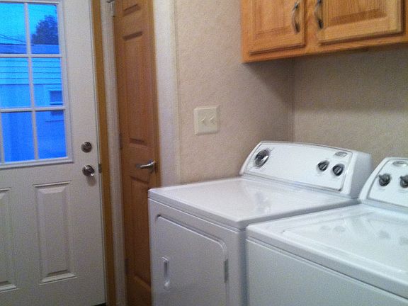 Laundry room with side door