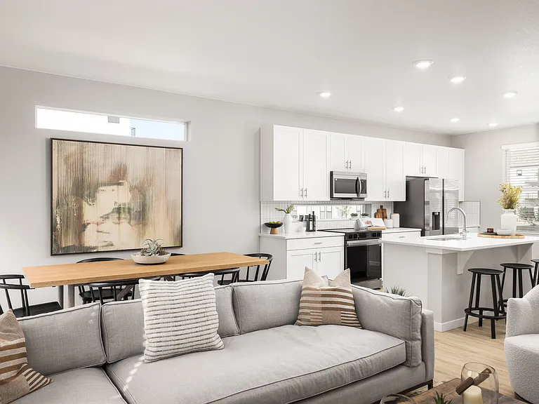 Quartz countertops with designer tile backsplashes.