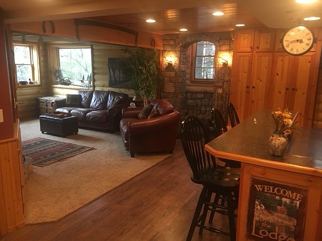 Kitchen with bar stools. We also have a small table and chairs to place in front of the window