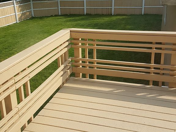 1 of 3 decks on this home. Fenced Yard