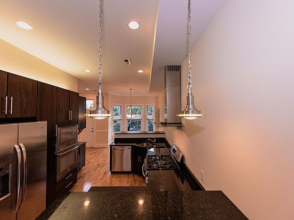 Chef's kitchen with stainless steel appliances