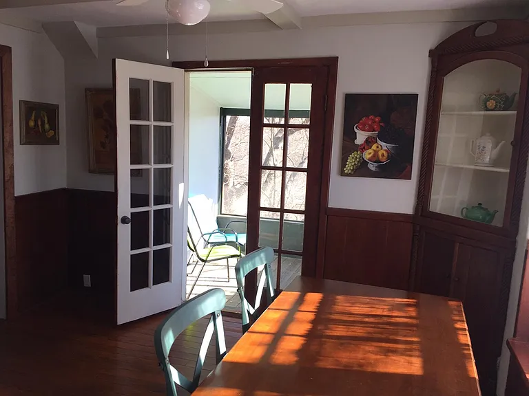 Dining room has two corner cabinets to fit the period. New wiring throughout.
