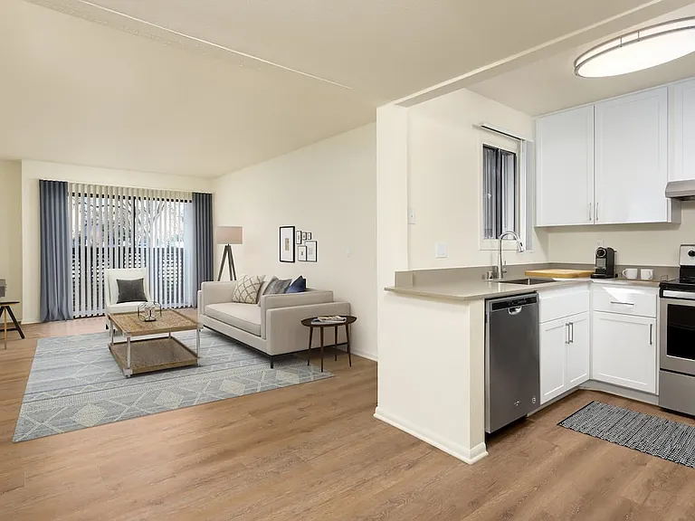 Renovated I kitchen and living room with hard surface flooring