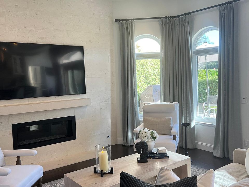 Living Room with Limestone fireplace