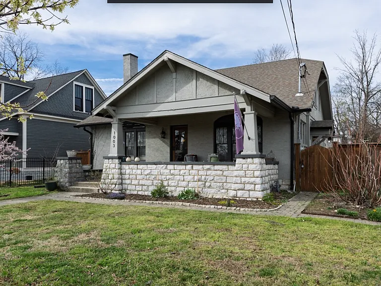 Slow down and stay awhile. The spacious covered porch offers the perfect place to unwind, gather with friends, and enjoy life in one of Nashville's most beloved neighborhoods.