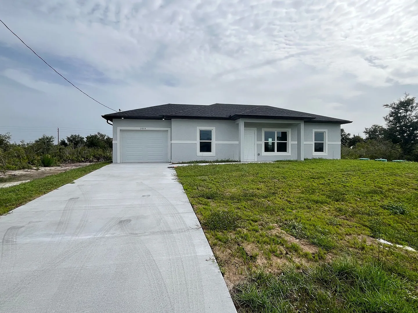 New Construction- Modern 3 Bed / 2 Bath Home In Lehigh Acres — Photo 1