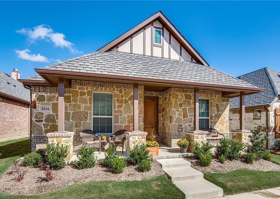Super charming drive up appeal with large, inviting front porch to relax and enjoy the outdoors. Nice stone and brick elevation enhance the homes appeal even more!
