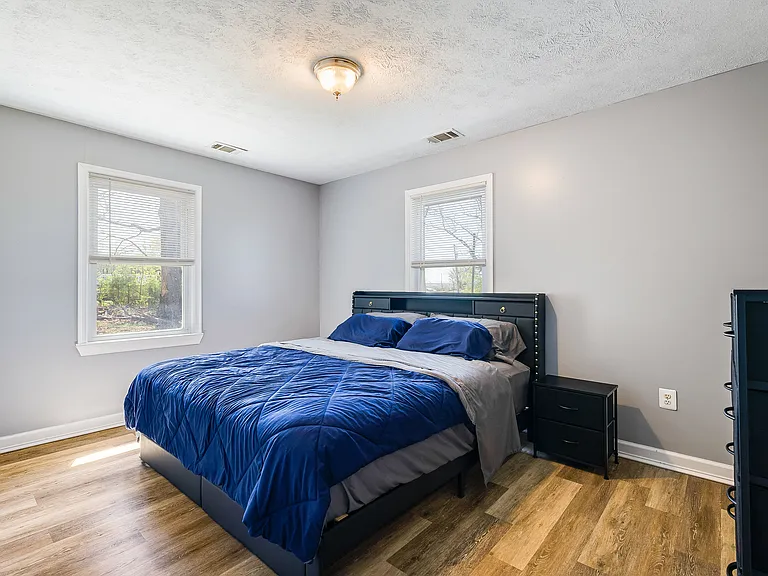 Bedroom 1 with King size bed and ensuite full bathroom.