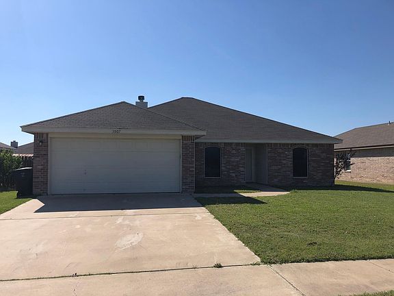 Two car garage and oversized driveway!