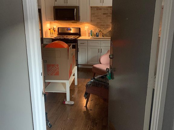 Entry from foyer to Condo as occupied