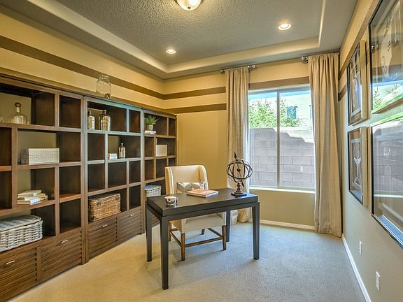 The den is a great area for an at home office or an additional game room for entertaining guests.