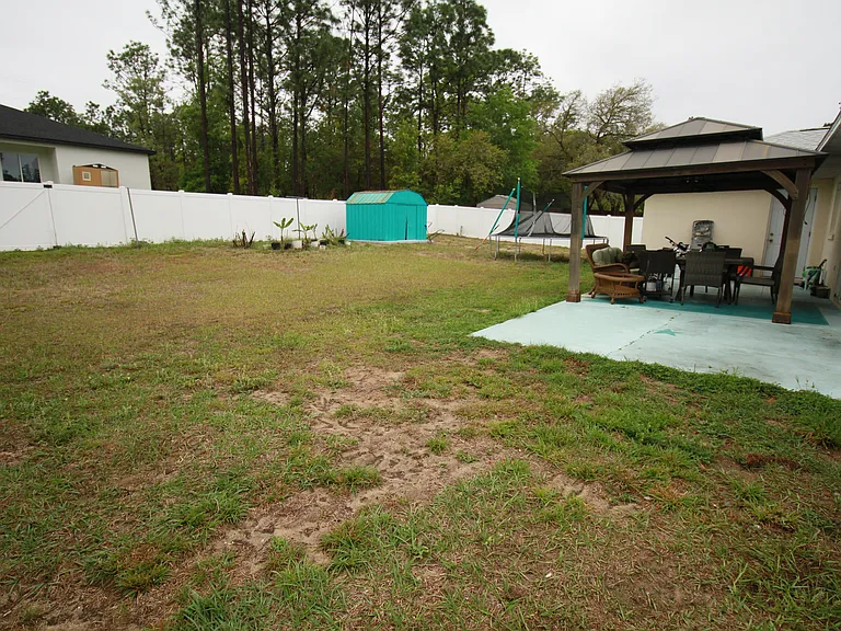 Gazebo, patio set, and trampoline not included