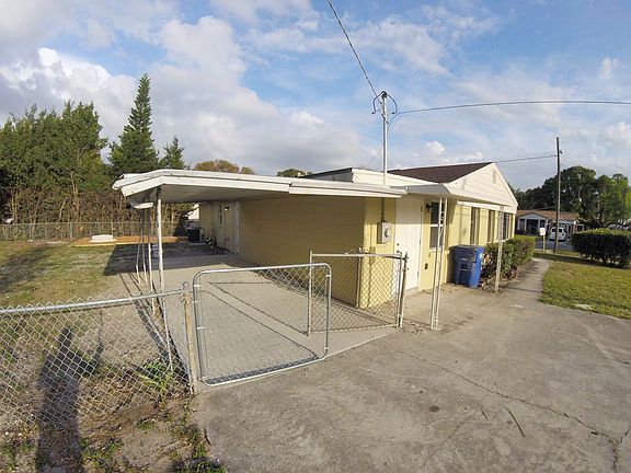 carport & enclosed back yard