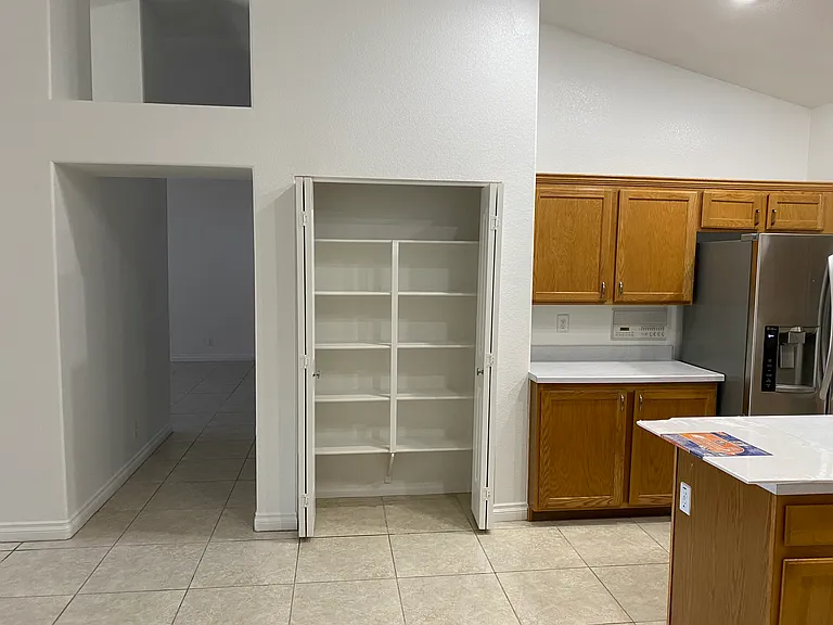 Kitchen - Pantry for easy access to food.