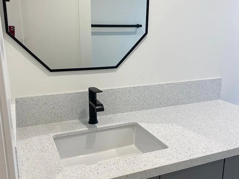 Quartz counters throughout, new gray shaker cabinets, tastefully decorated.