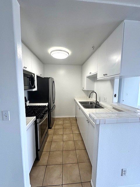 Bright kitchen with stainless steel appliances