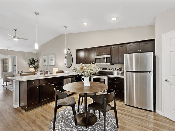 Enjoy Granite Countertops and Upgraded Appliances in Your New Kitchen