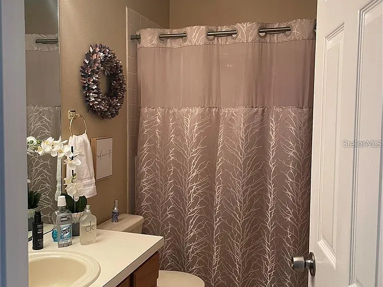 HALL BATH SHARED WITH THREE BEDROOMS UPSTAIRS