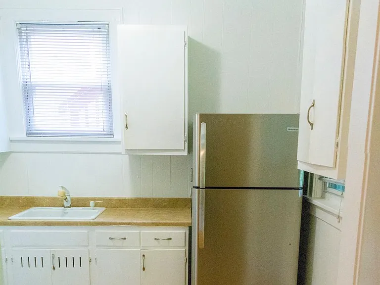 Kitchen area with lots of natural sunlight.