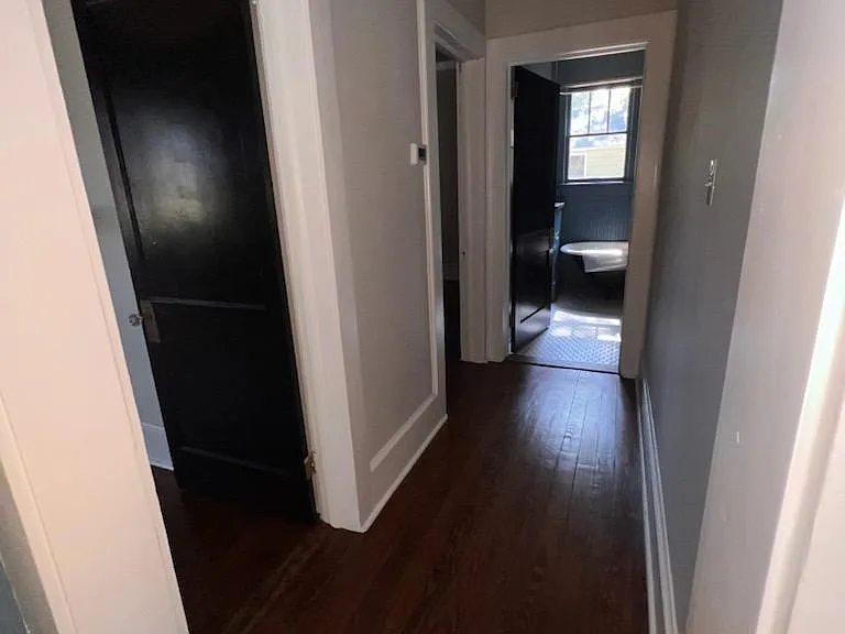 Hallway with Bedroom 2, Bedroom 3, and Bathroom doors visible