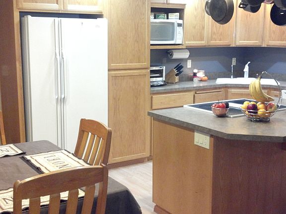 View of kitchen from eating area