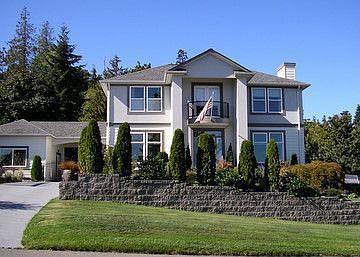 This stately traditionally styled home offers mountain and bay views!