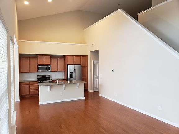 Open living area with cathedral ceilings