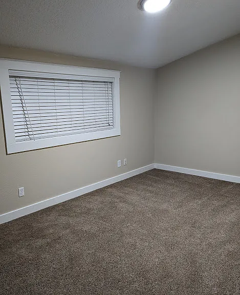 Upstairs bedroom with walk in closet.