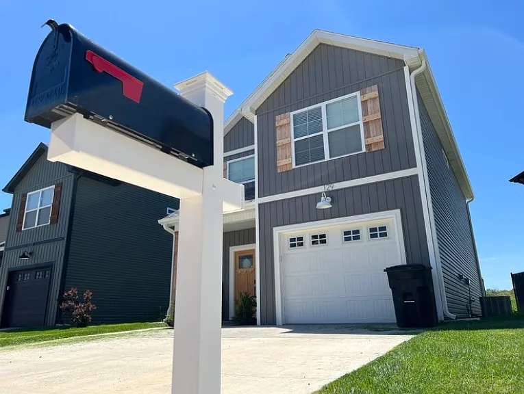 Mailbox and 2-car Driveway with Attached 1-car Garage