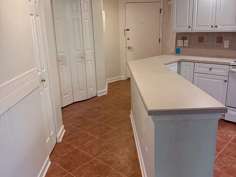 Looking toward front door in hallway