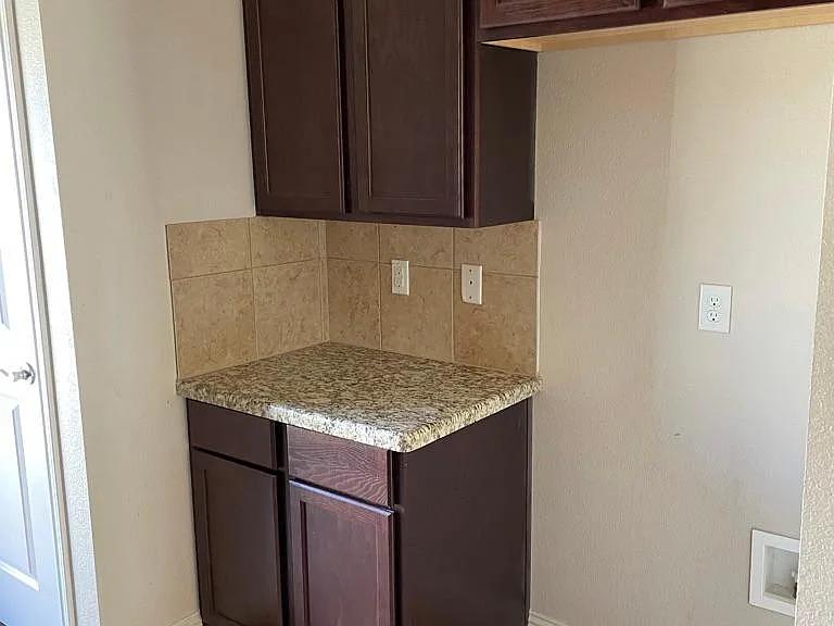 Kitchen - Space for Refrigerator with lots of storage