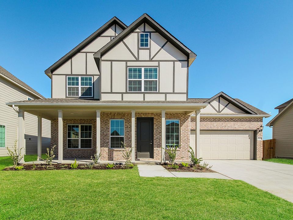 exterior of single family home with attached garage and driveway