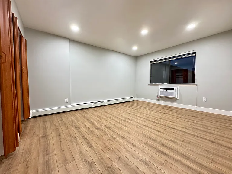 The 1st Bedroom includes brand new flooring and new ceiling lights.