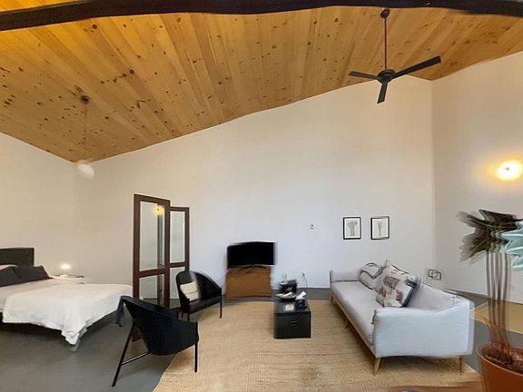 Sleeping Area (l) with Living Area (r)