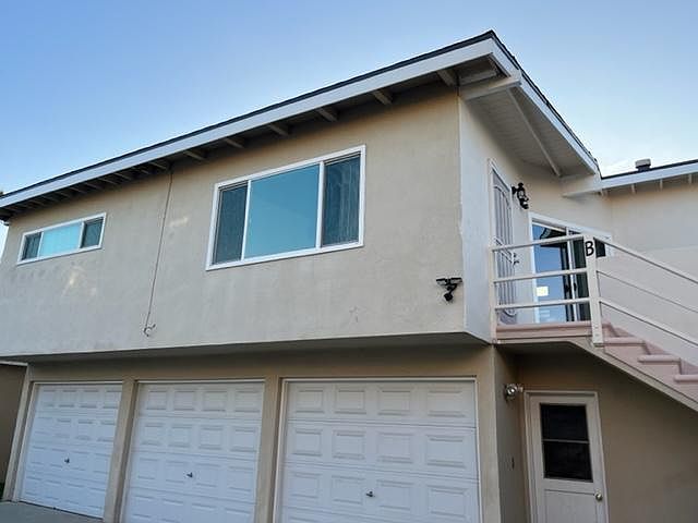 Unit is over a 3 car garage