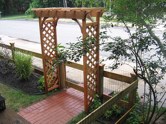 Front cedar arbor