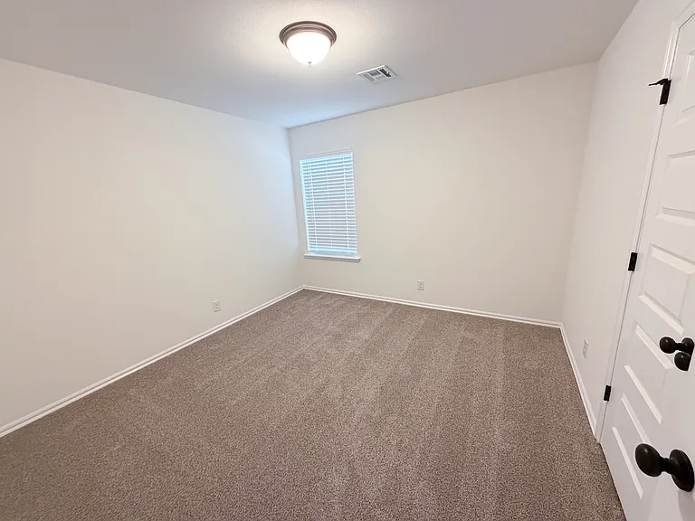 9407 N 116th East Ave — Photo 15