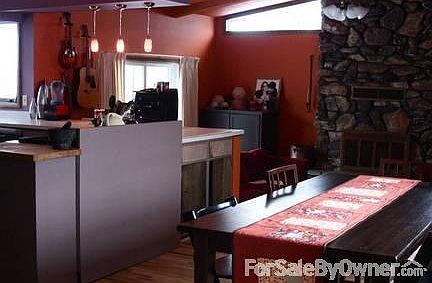Dining room
						:
						Open concept home. View from dining room into kitchen and family room.