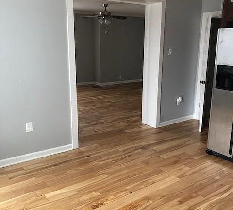 Kitchen area going into living room
